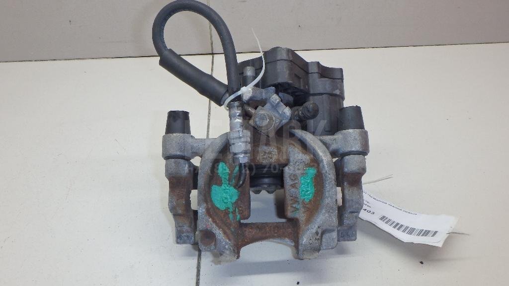 Суппорт тормозной задний левый