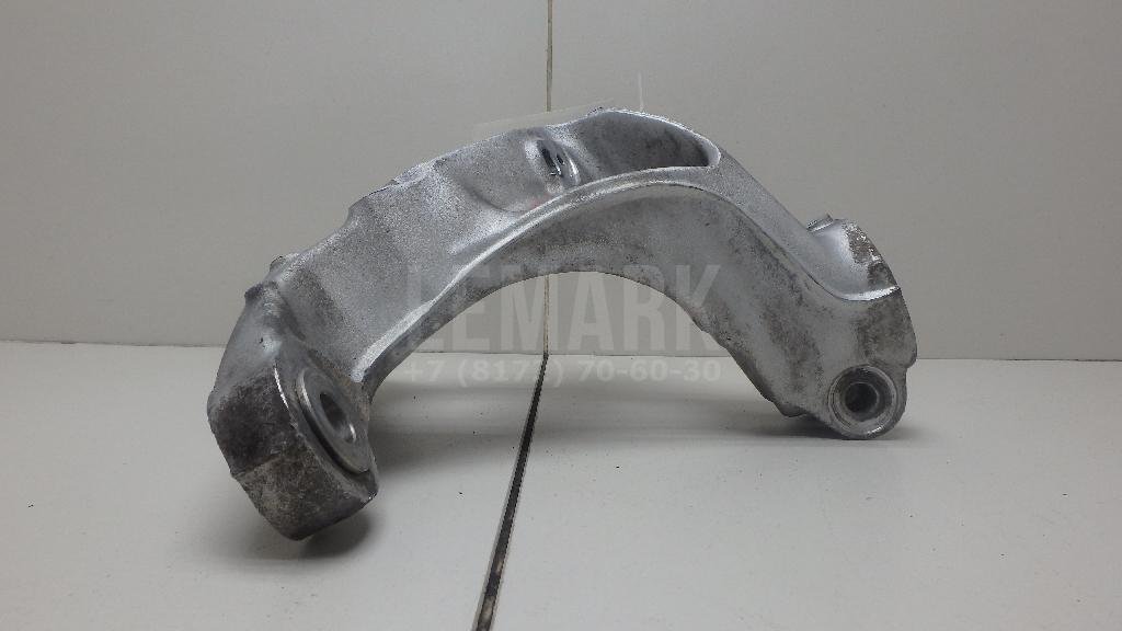 Кулак поворотный передний левый