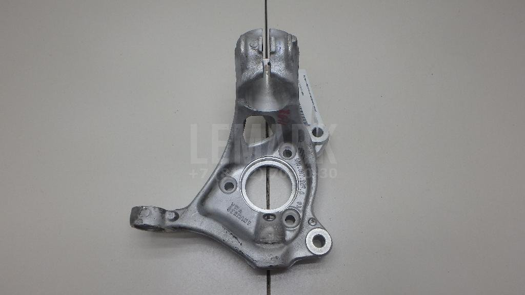 Кулак поворотный передний левый