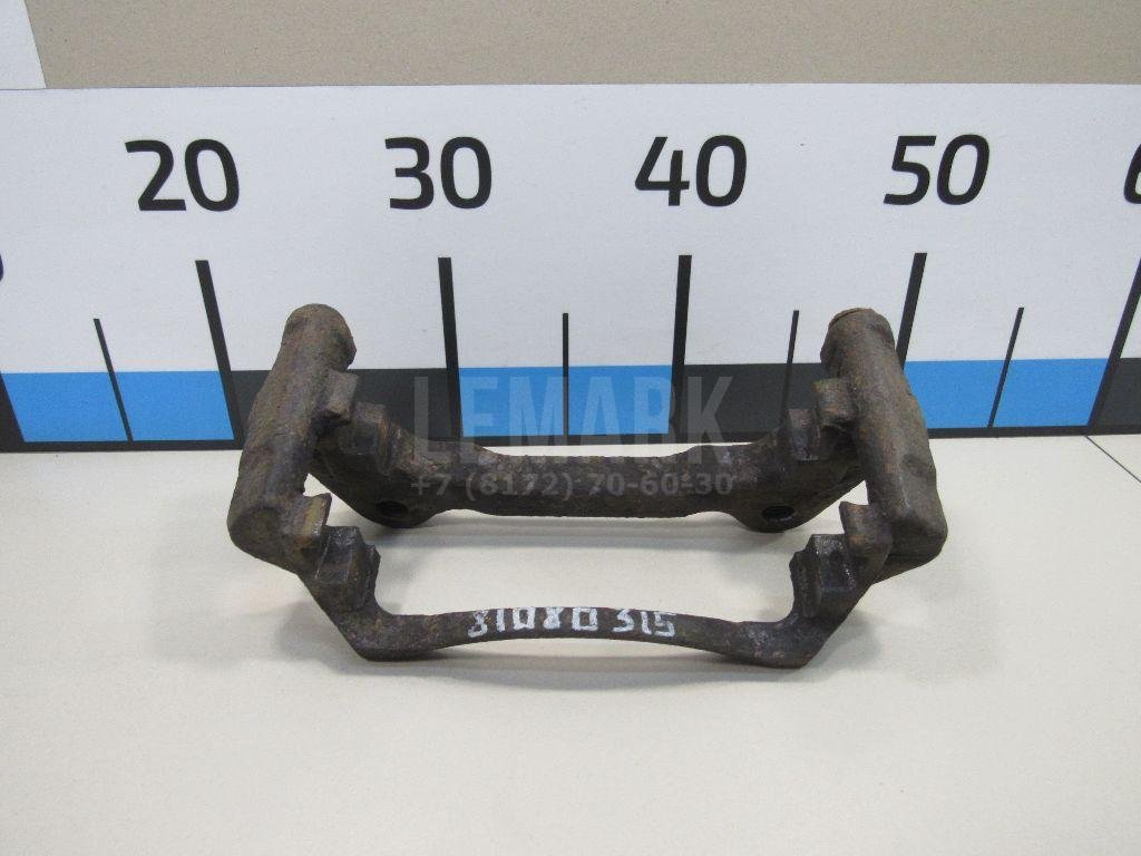 Скоба суппорта переднего левого