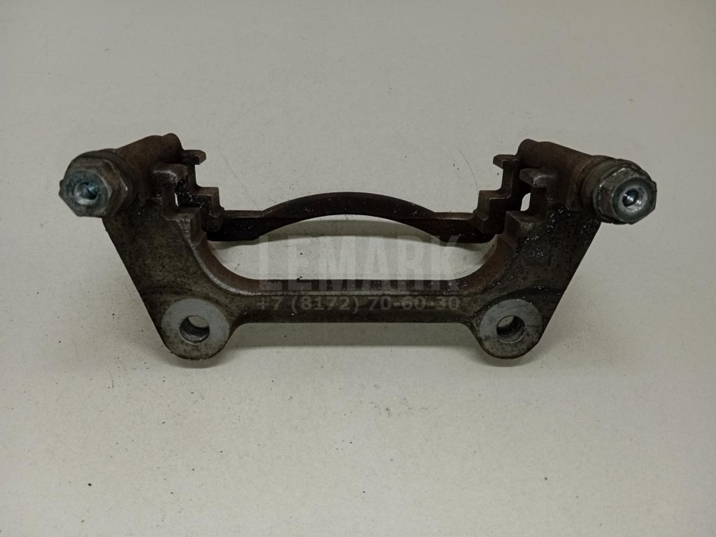 Скоба суппорта переднего левого
