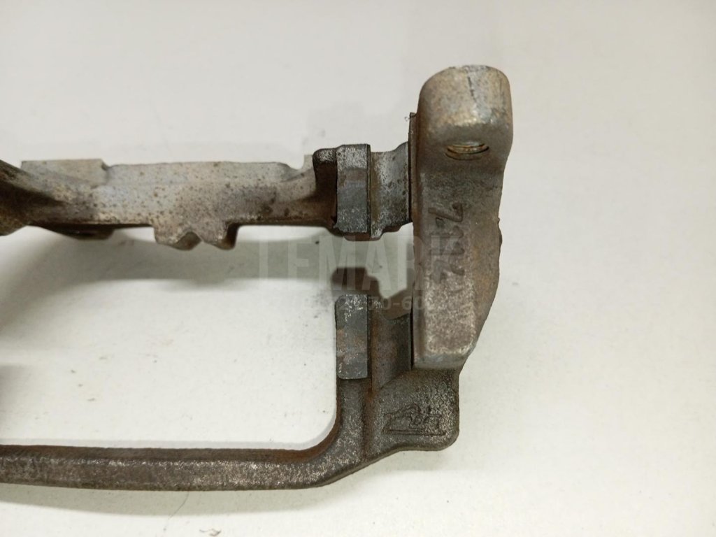 Скоба суппорта заднего