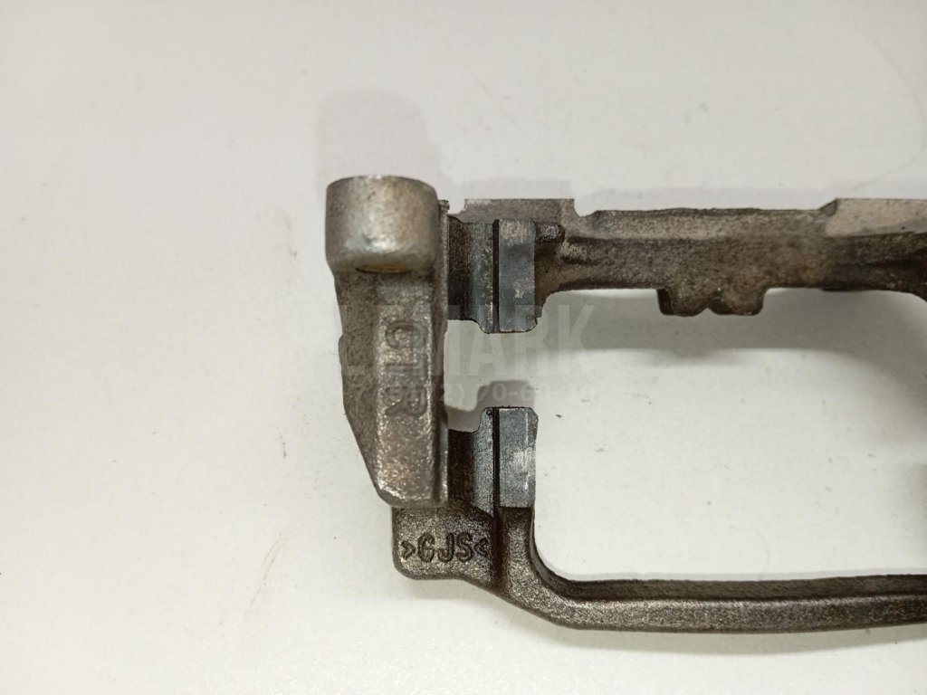 Скоба суппорта заднего