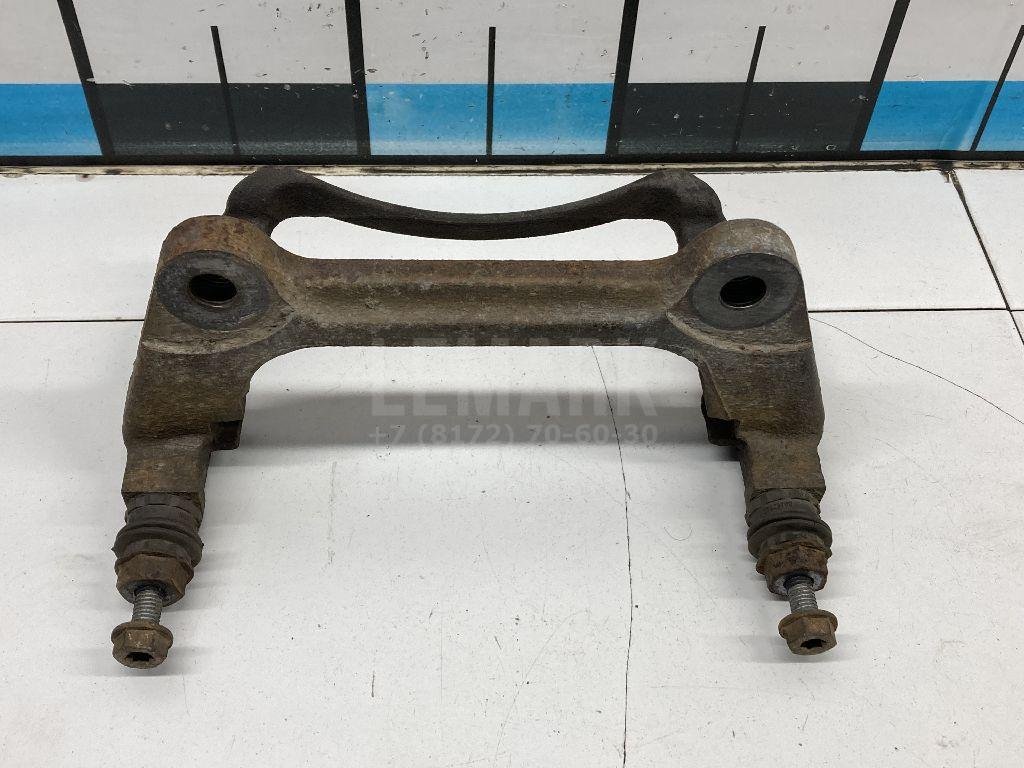 Скоба суппорта переднего левого