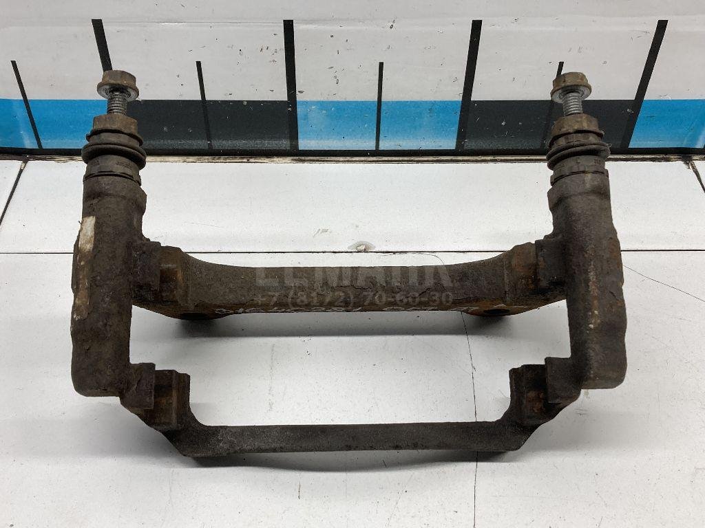 Скоба суппорта переднего левого