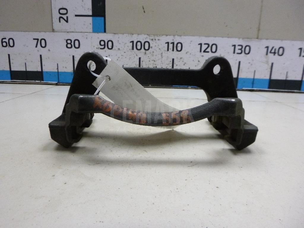 Скоба суппорта переднего левого