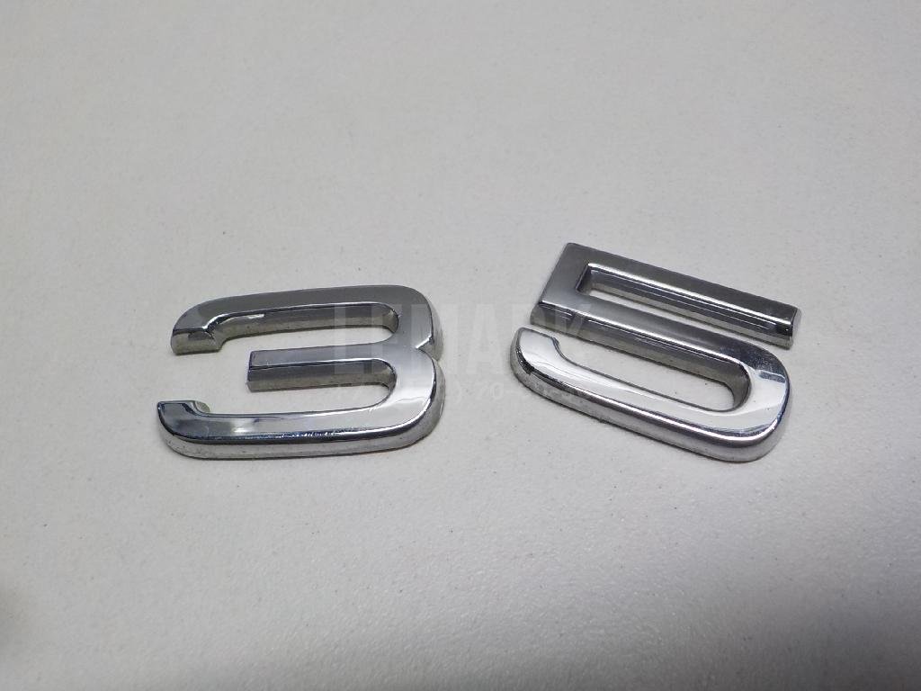 Эмблема на крышку багажника