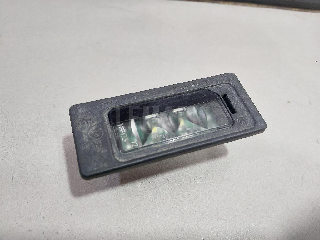 Фонарь подсветки номера