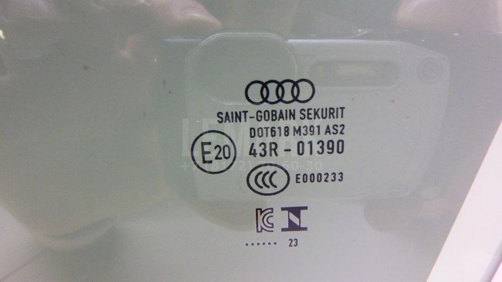 Стекло двери передней левой