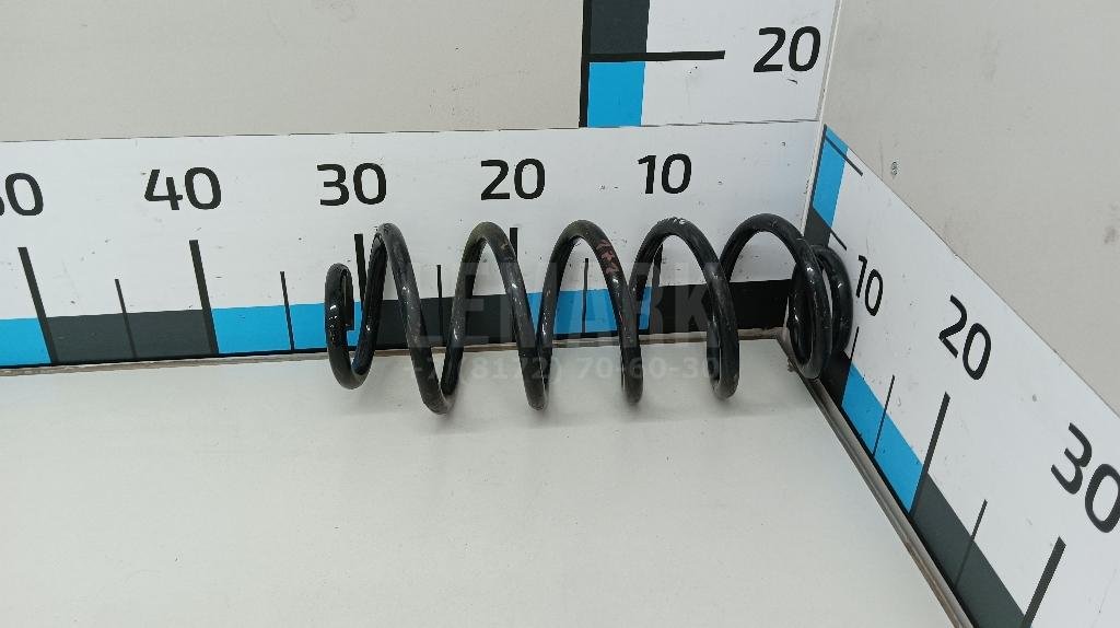 Пружина передняя