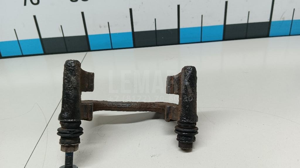 Скоба суппорта заднего