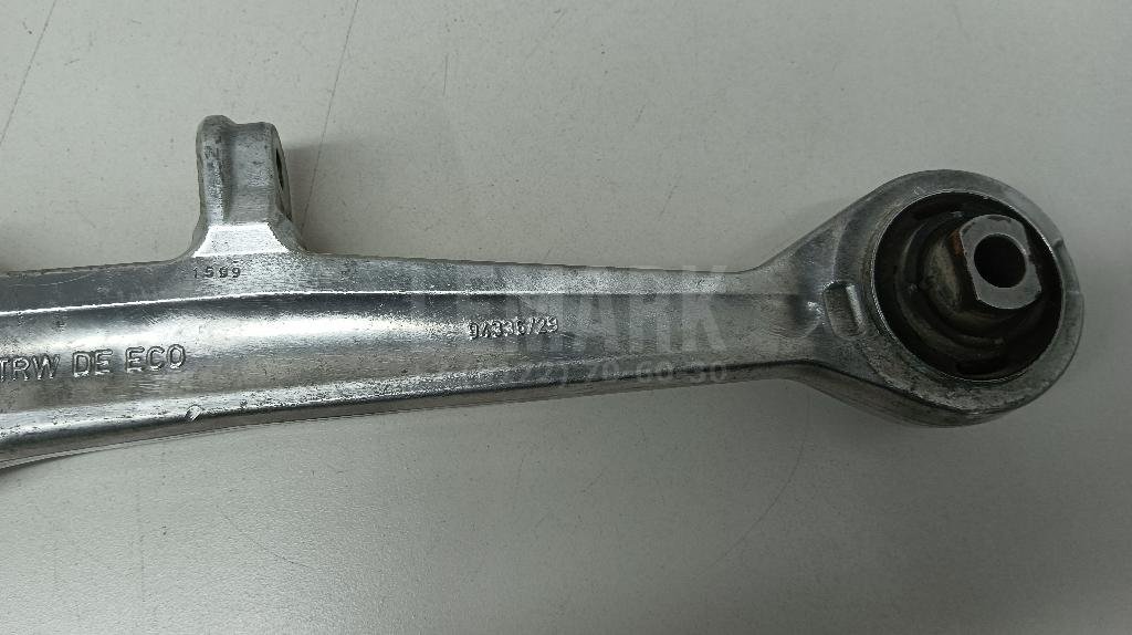 Рычаг передний нижний