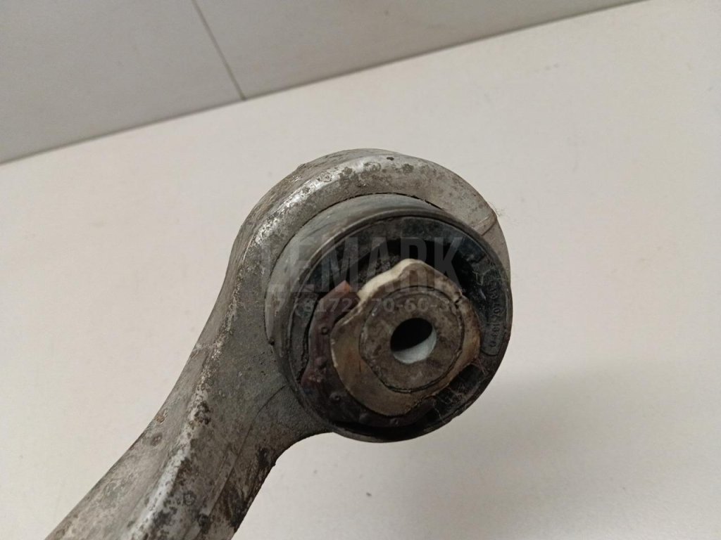 Рычаг передний нижний левый задний