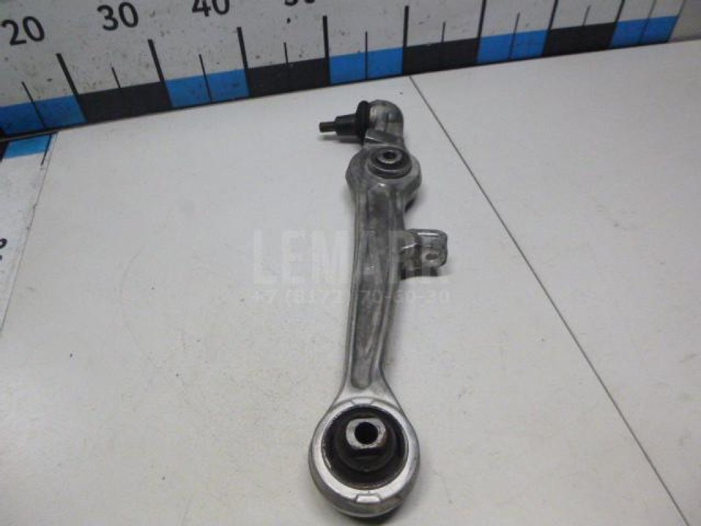 Рычаг передний нижний