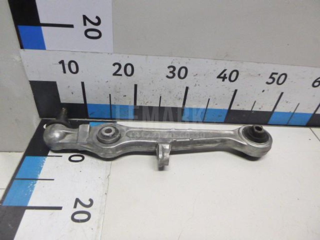 Рычаг передний нижний