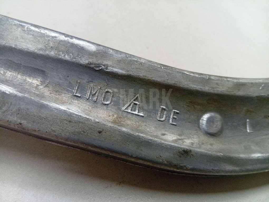 Рычаг передний нижний левый задний