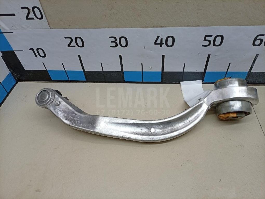 Рычаг передний нижний левый задний