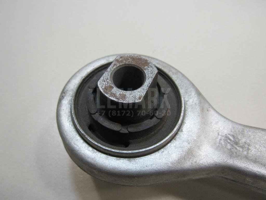 Рычаг передний нижний