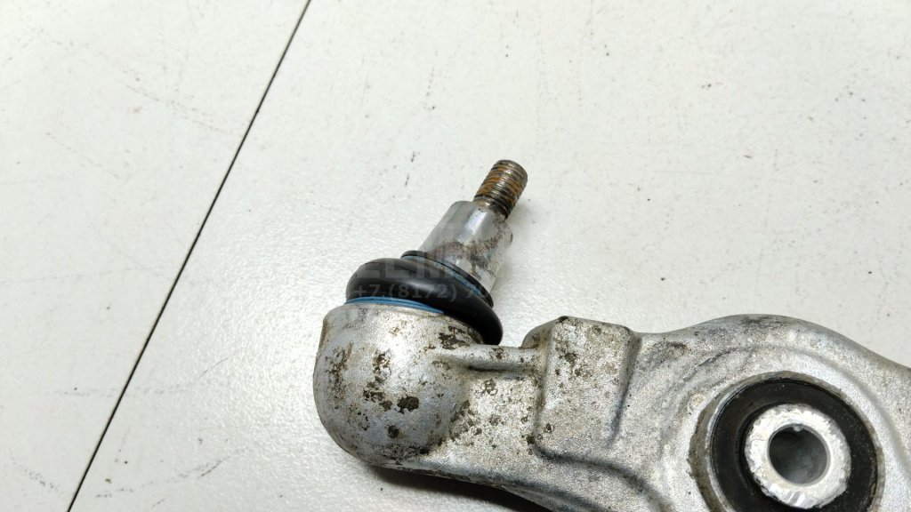 Рычаг передний нижний