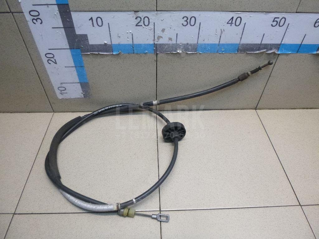Трос стояночного тормоза левый