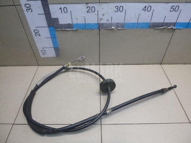 Трос стояночного тормоза левый