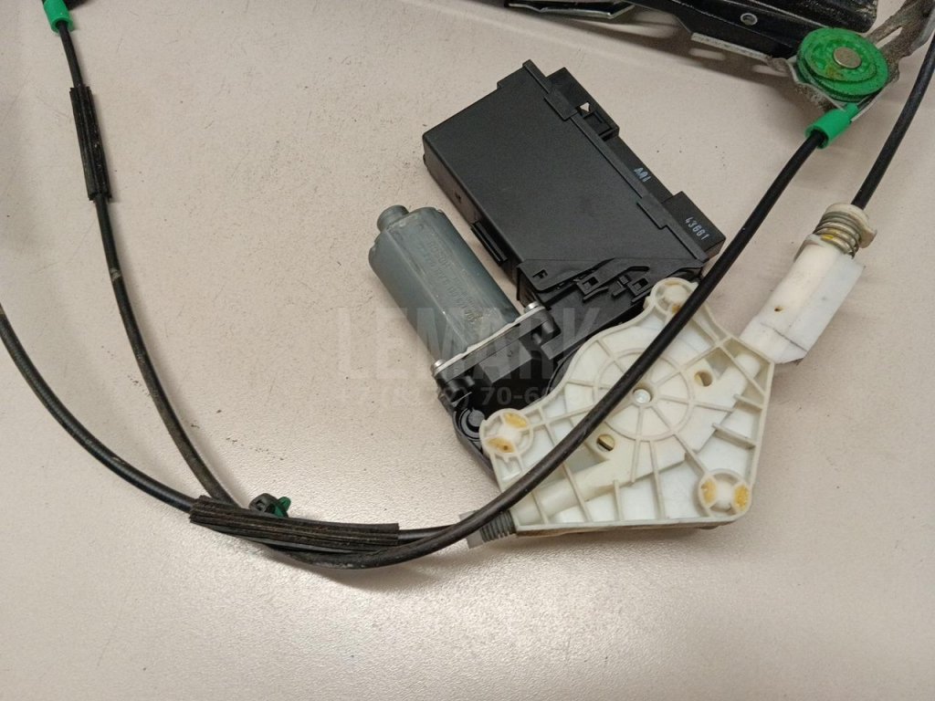 Стеклоподъемник электр. передний левый