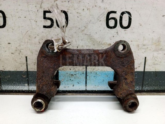 Скоба суппорта заднего