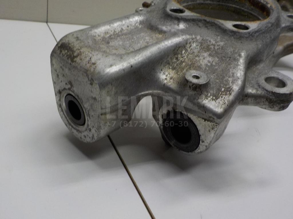 Кулак поворотный передний левый