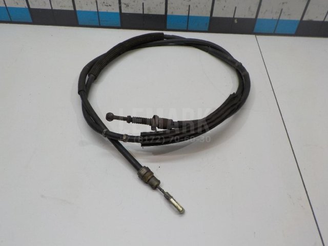 Трос стояночного тормоза правый