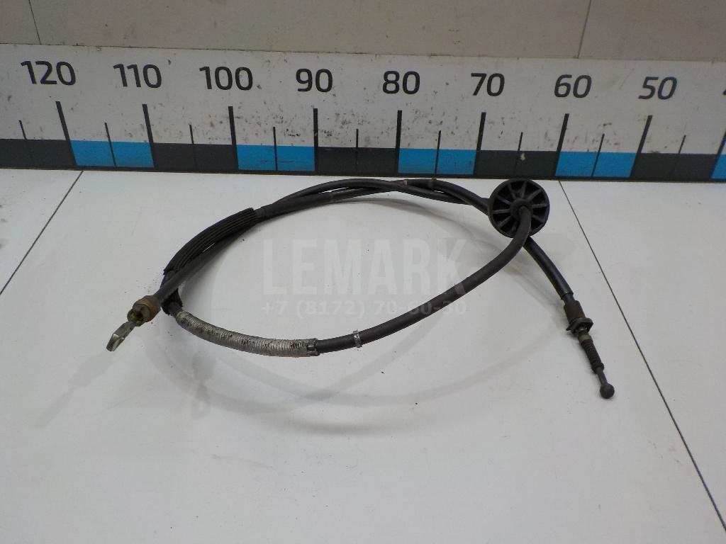 Трос стояночного тормоза левый