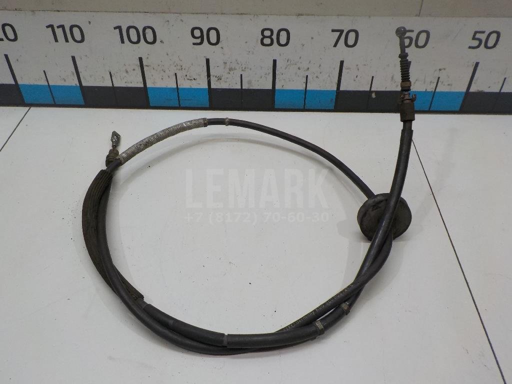 Трос стояночного тормоза левый