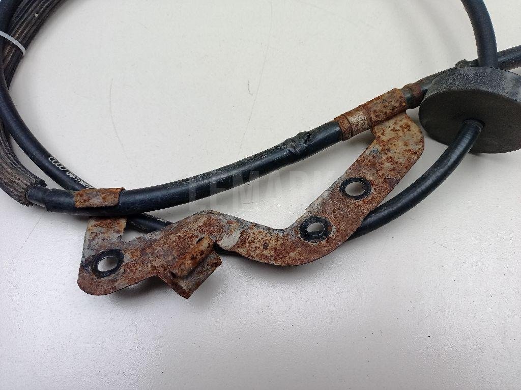 Трос стояночного тормоза левый