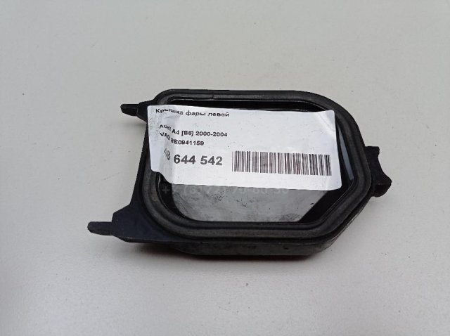 Крышка фары левой