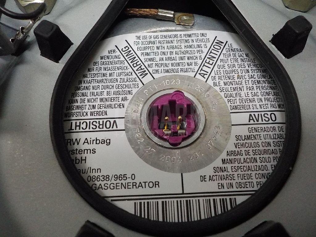 Подушка безопасности в рулевое колесо