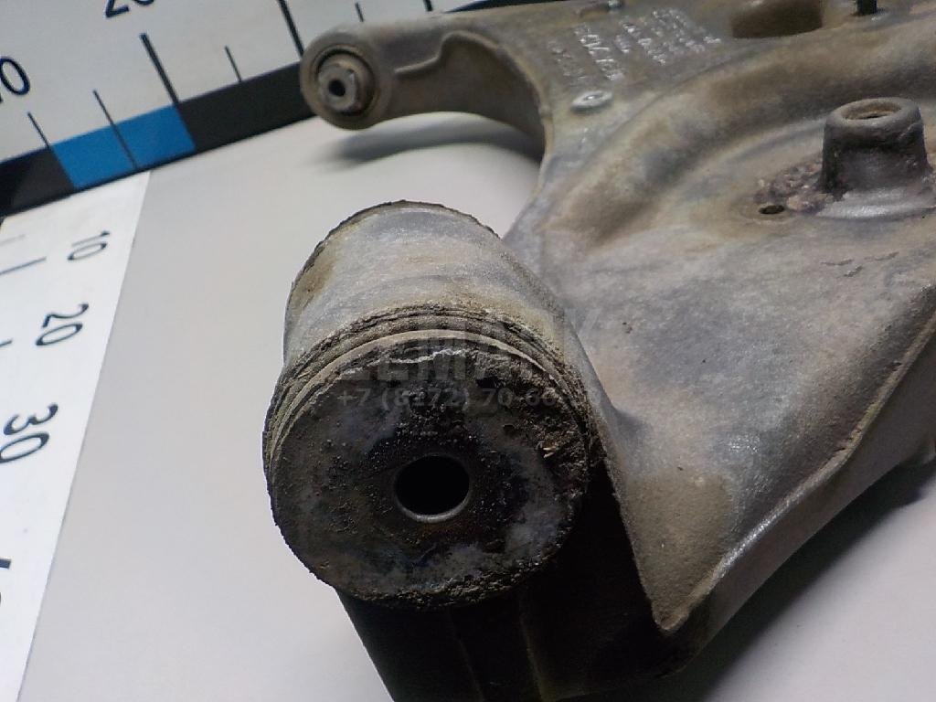 Рычаг задний нижний левый