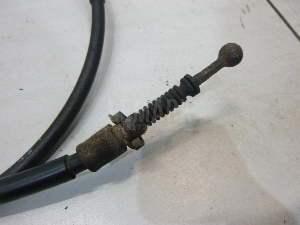 Трос стояночного тормоза левый