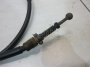 Трос стояночного тормоза левый
