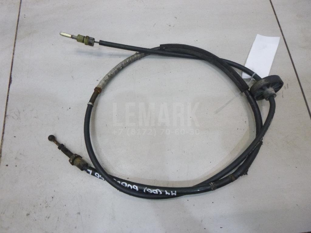 Трос стояночного тормоза левый