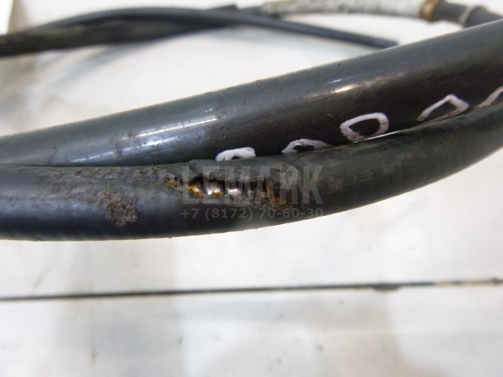 Трос стояночного тормоза левый