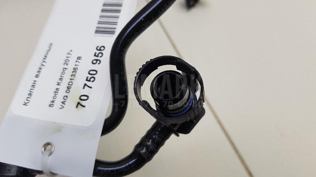 Клапан вакуумный