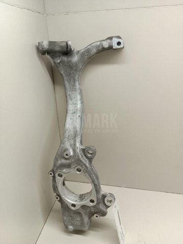 Кулак поворотный передний левый