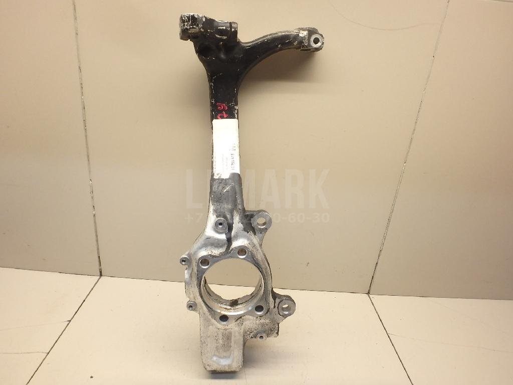 Кулак поворотный передний левый