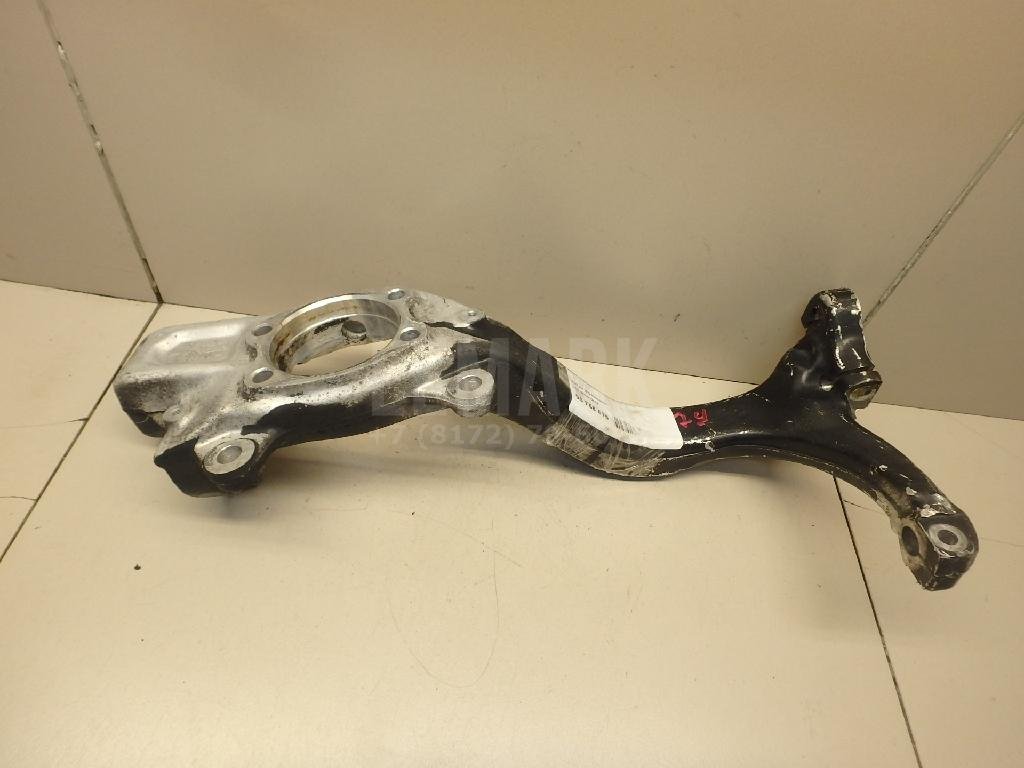 Кулак поворотный передний левый