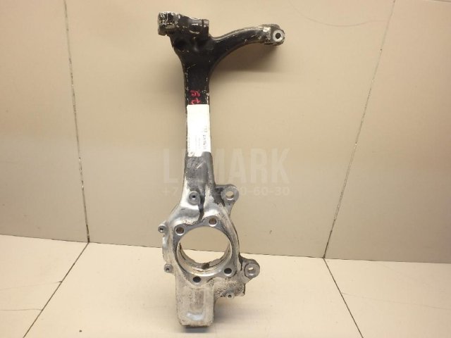 Кулак поворотный передний левый