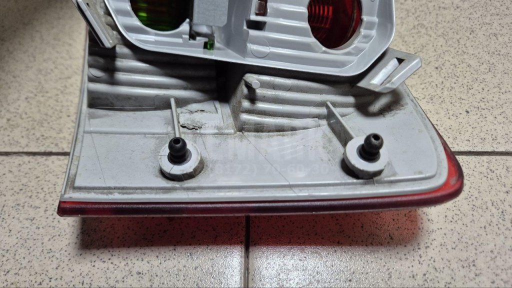 Фонарь задний наружный левый