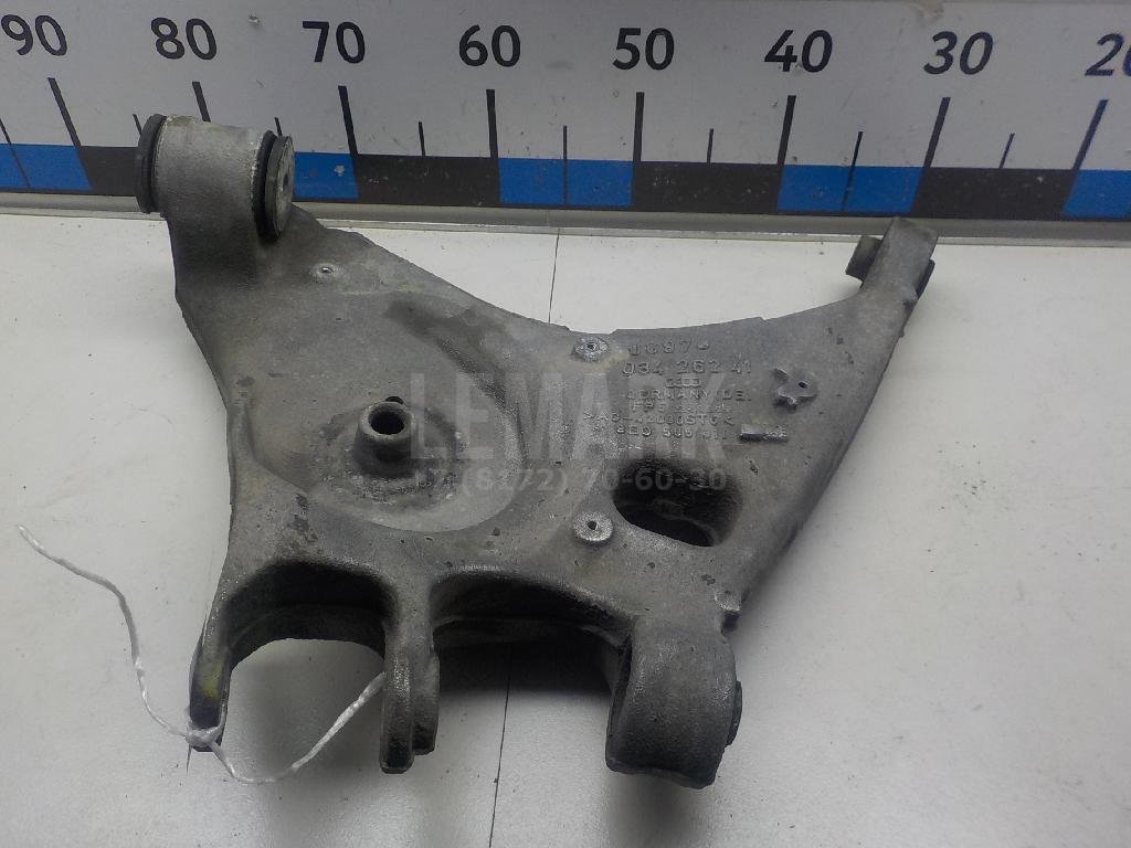 Рычаг задний нижний левый