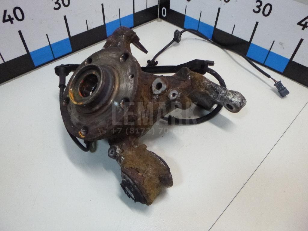 Кулак поворотный задний левый