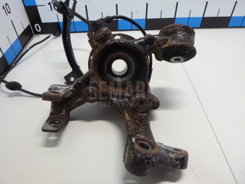 Кулак поворотный задний левый