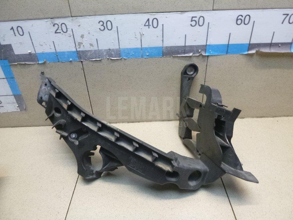 Кронштейн фар правый