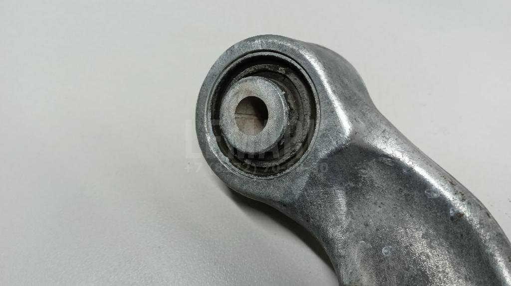 Рычаг задний верхний левый